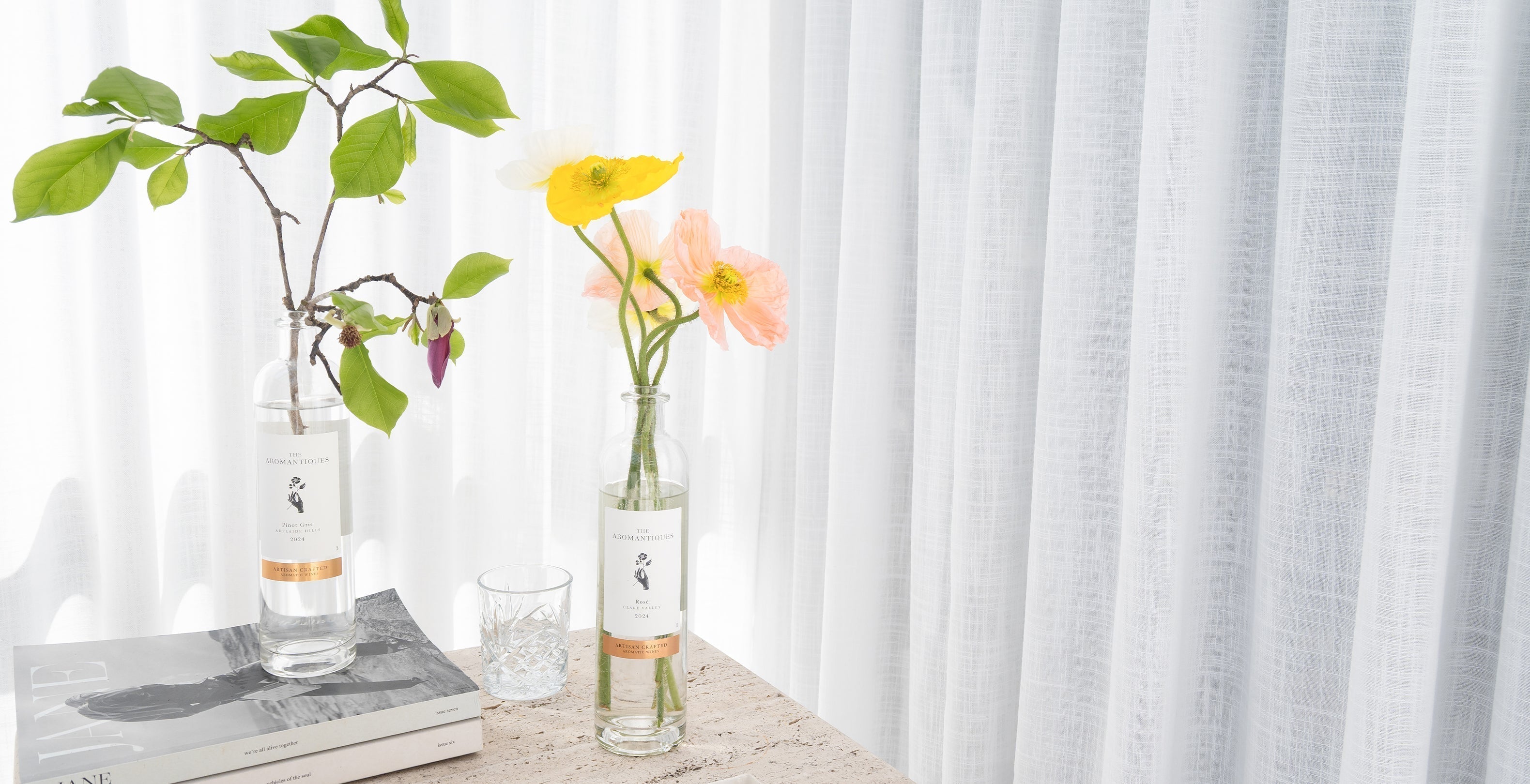 6 Stylish Ways to Upcycle Wine Bottles: The Aromantiques Guide to Sustainable Style