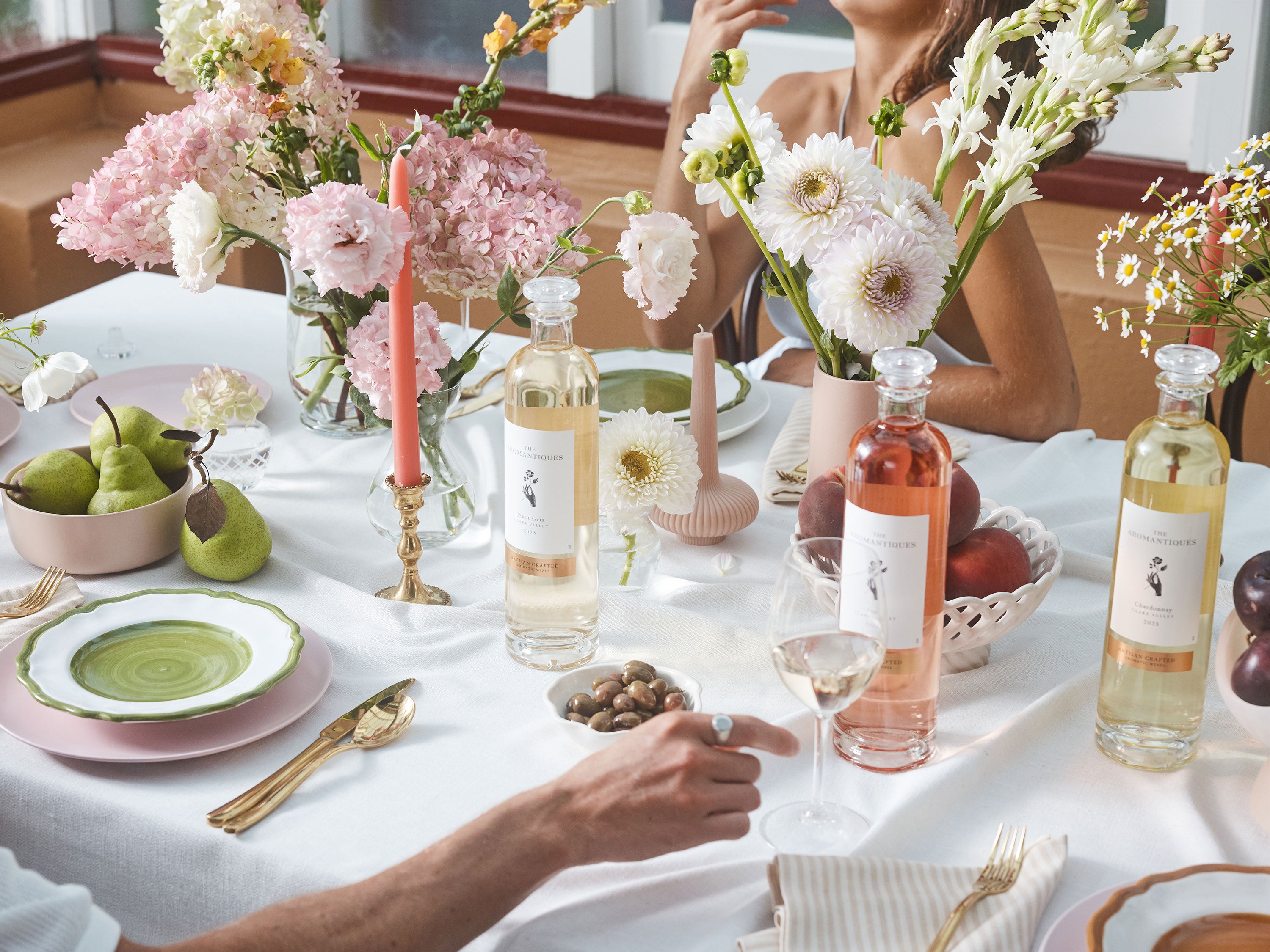 Table setting featuring The Aromantiques Wines